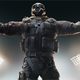 A man carrying a hammer and wearing tactical gear as seen in R6 Siege.